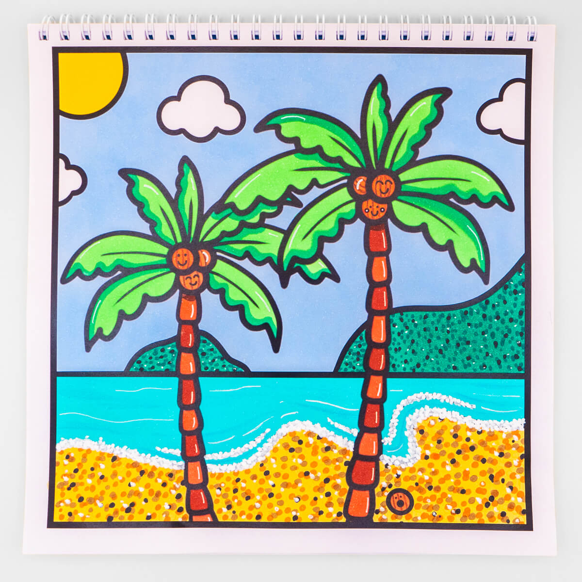 Colour With Em beach-themed colouring page featuring two smiling palm trees on a sunny tropical shore.